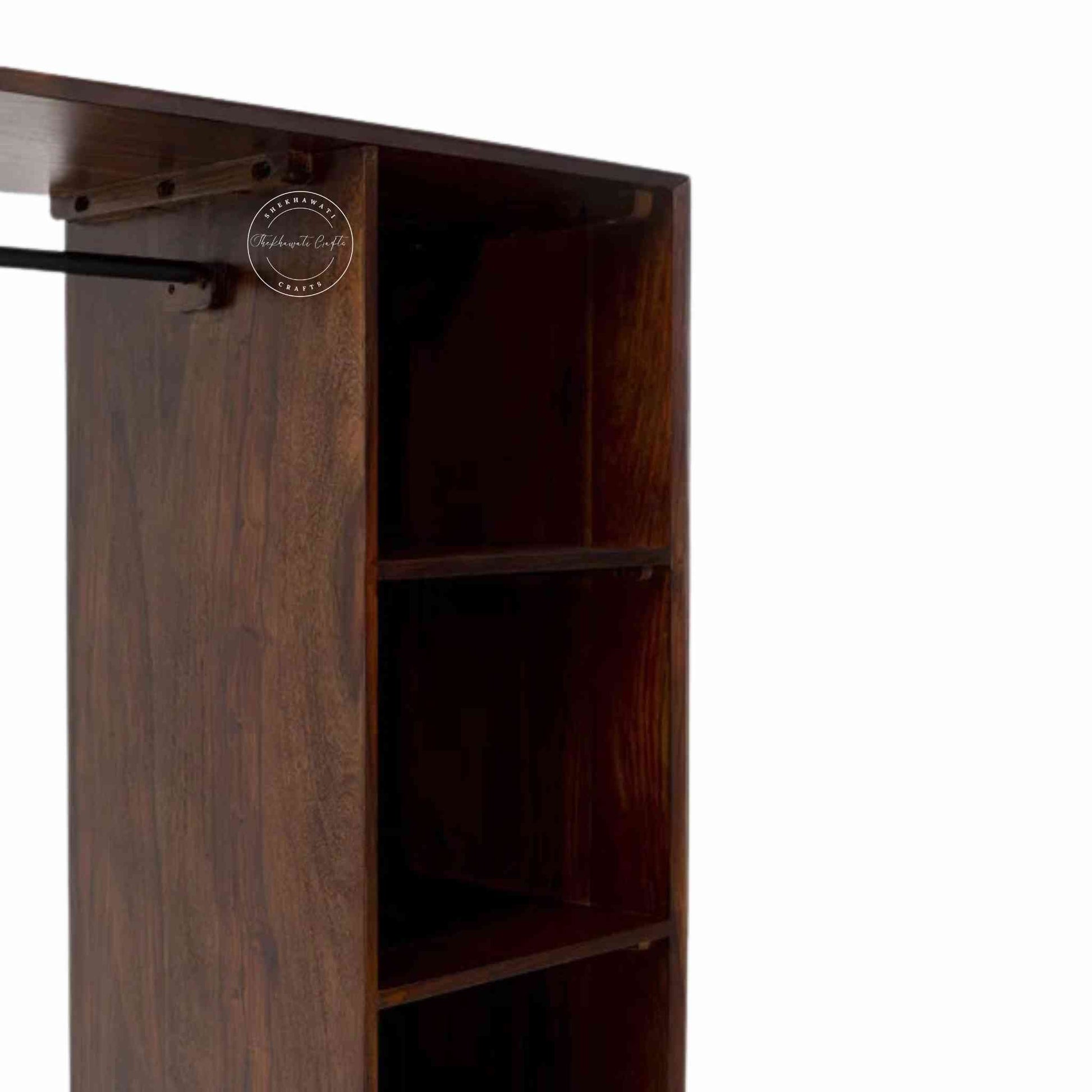 Esme Closet is handcrafted from Sheesham wood with a walnut finish, detachable shelves, a clothes hanger, and 5 spacious shelves.