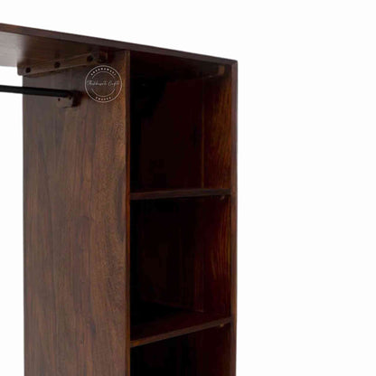 Esme Closet is handcrafted from Sheesham wood with a walnut finish, detachable shelves, a clothes hanger, and 5 spacious shelves.