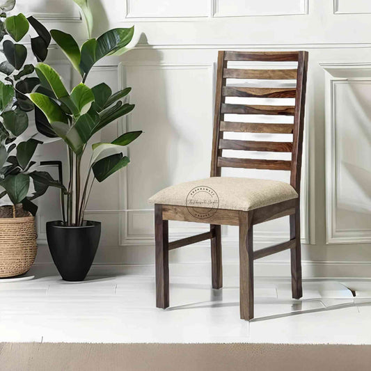 Given Chair is handcrafted from sheesham wood with a unique backrest design, comfortable seating cushion and a modern design.
