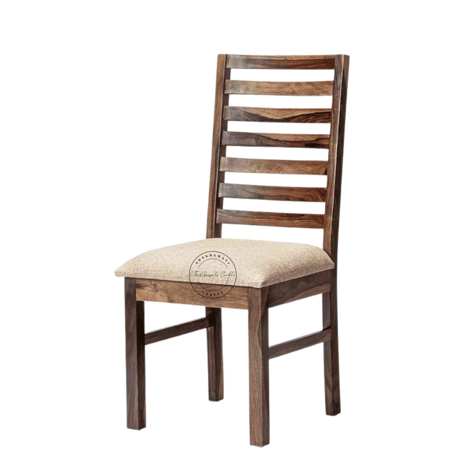 Given Chair is handcrafted from sheesham wood with a unique backrest design, comfortable seating cushion and a modern design.