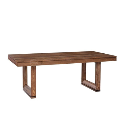 A rectangular wooden dining table with a medium brown finish and a unique geometric A-frame leg design, shown against a plain white background.
