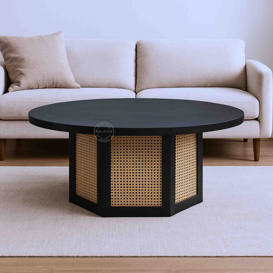 hexacane rattan coffee table is crafted from mango wood with rattan cane and matte black finish.
