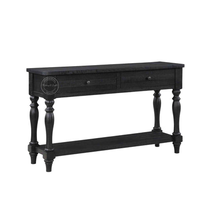 Julian console table is handcrafted from mango wood and a matte black finish.