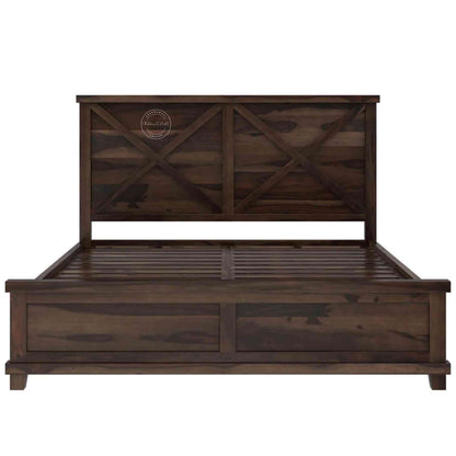 A king-size wooden bed with a dark walnut finish, featuring a headboard and footboard.