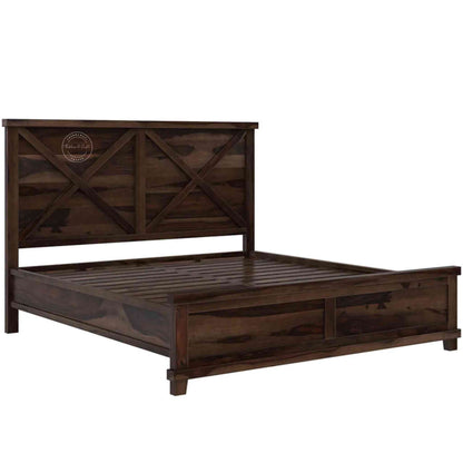 A king size wooden bed with a dark walnut finish, featuring a headboard and footboard.