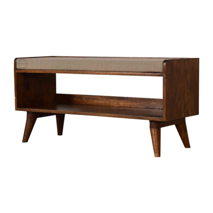 Lammi Bench is handcrafted with sheesham wood, cushion, honey finish, detachable legs and a storage shelf.