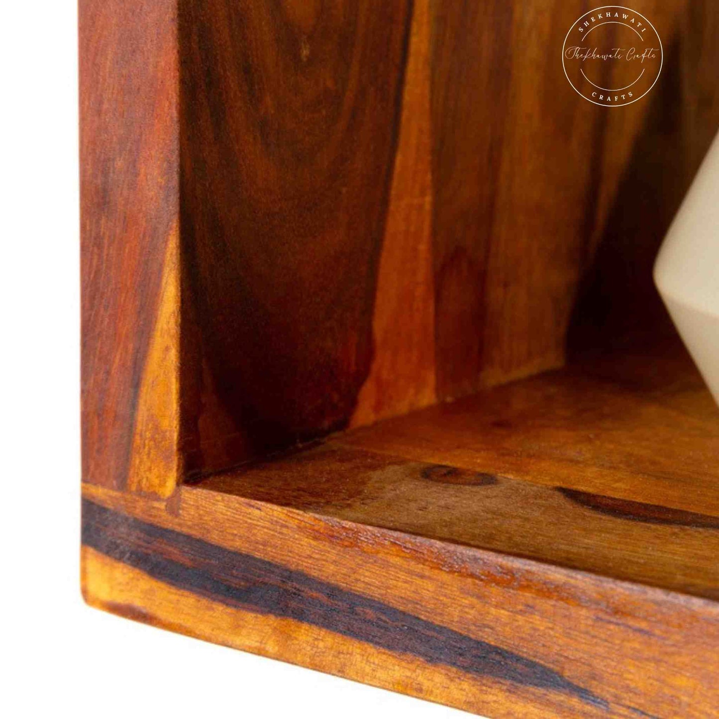 Close-up look of the wooden wall shelf rack set 