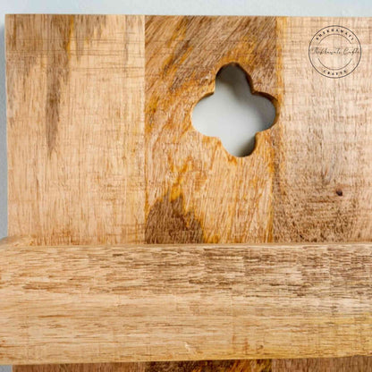 Levon Solid Wood Wall Hanging Shelf handcrafted from mango wood with four tiers and a natural finish — perfect for displaying decor, books, and accessories.