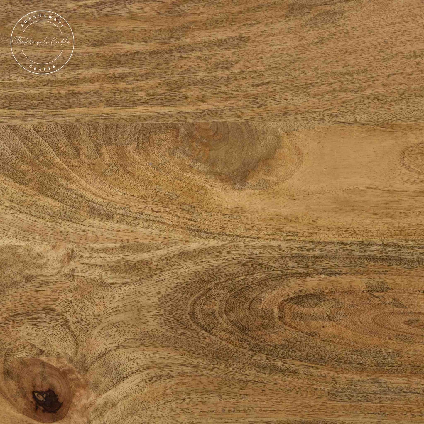 Maron wooden dining table is crafted with mango wood with a natural finish and round shape legs.