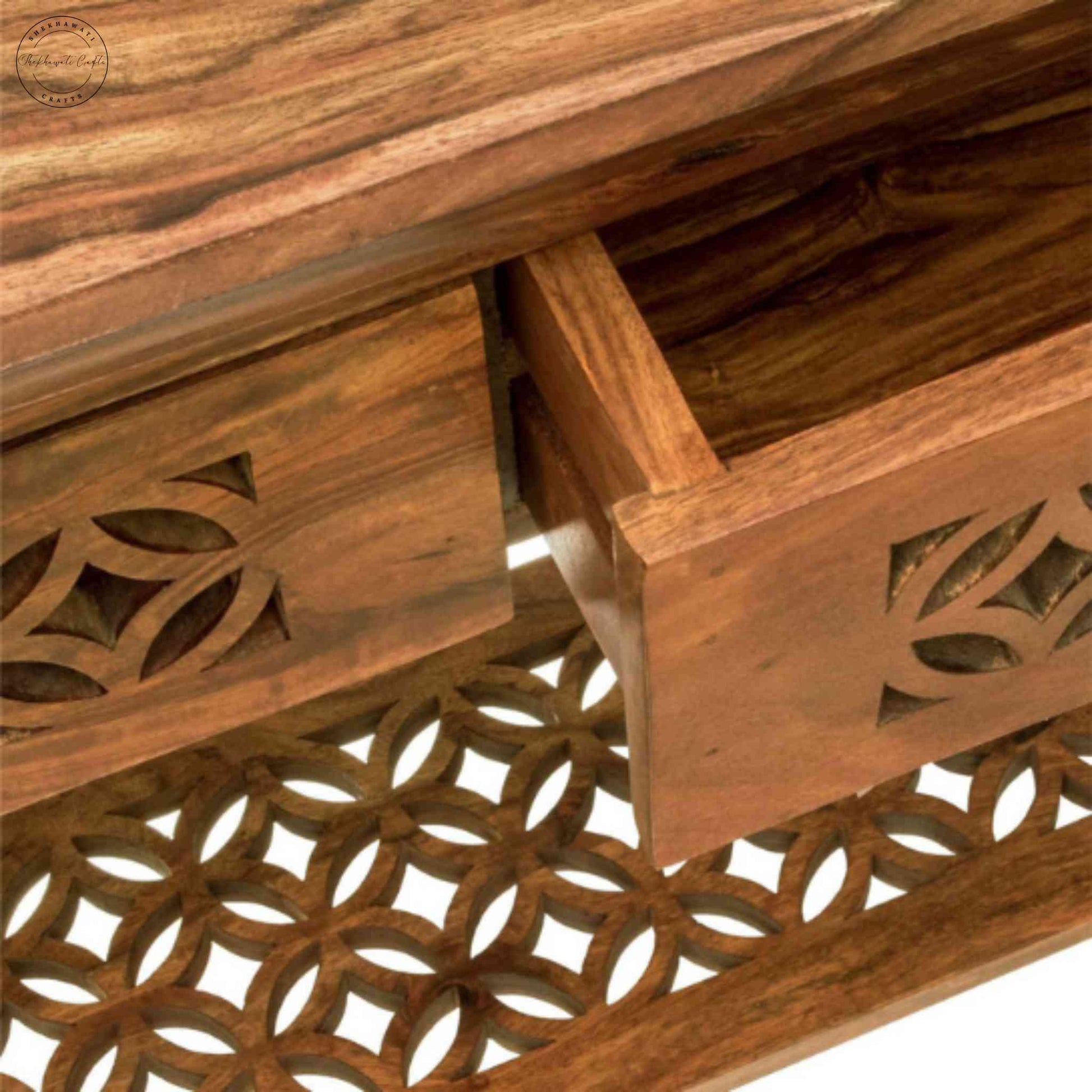 Mirra Console Table is handcrafted with sheesham wood, a honey finish, 2 drawers and a bottom shelf.