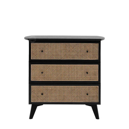 Murphy rattan chest of drawers crafted from solid mango wood with a rattan cane design, featuring a matte black finish and 3 drawers.