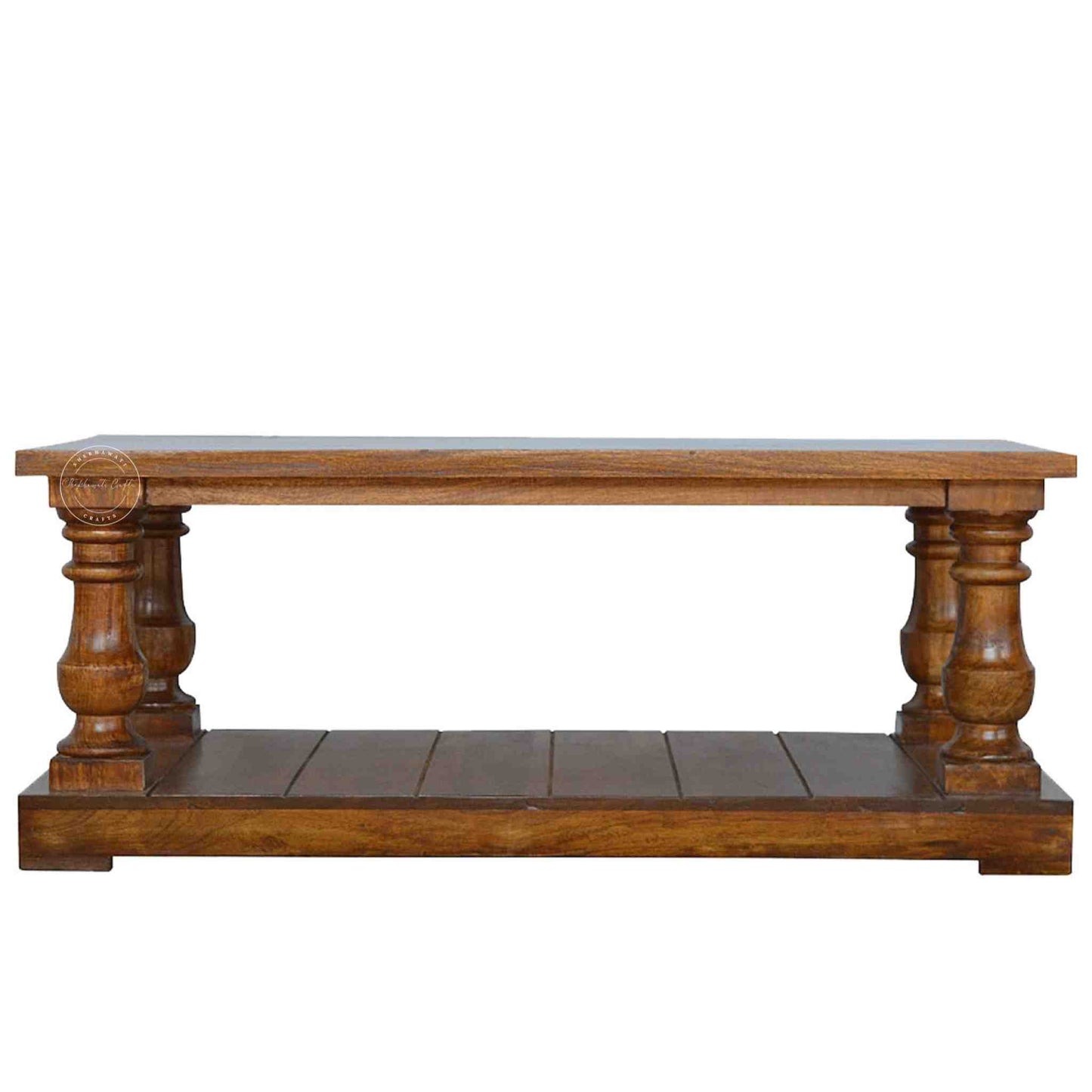 New City Center Table is made from Sheesham wood with a honey finish, antique-inspired design and bottom shelf storage.