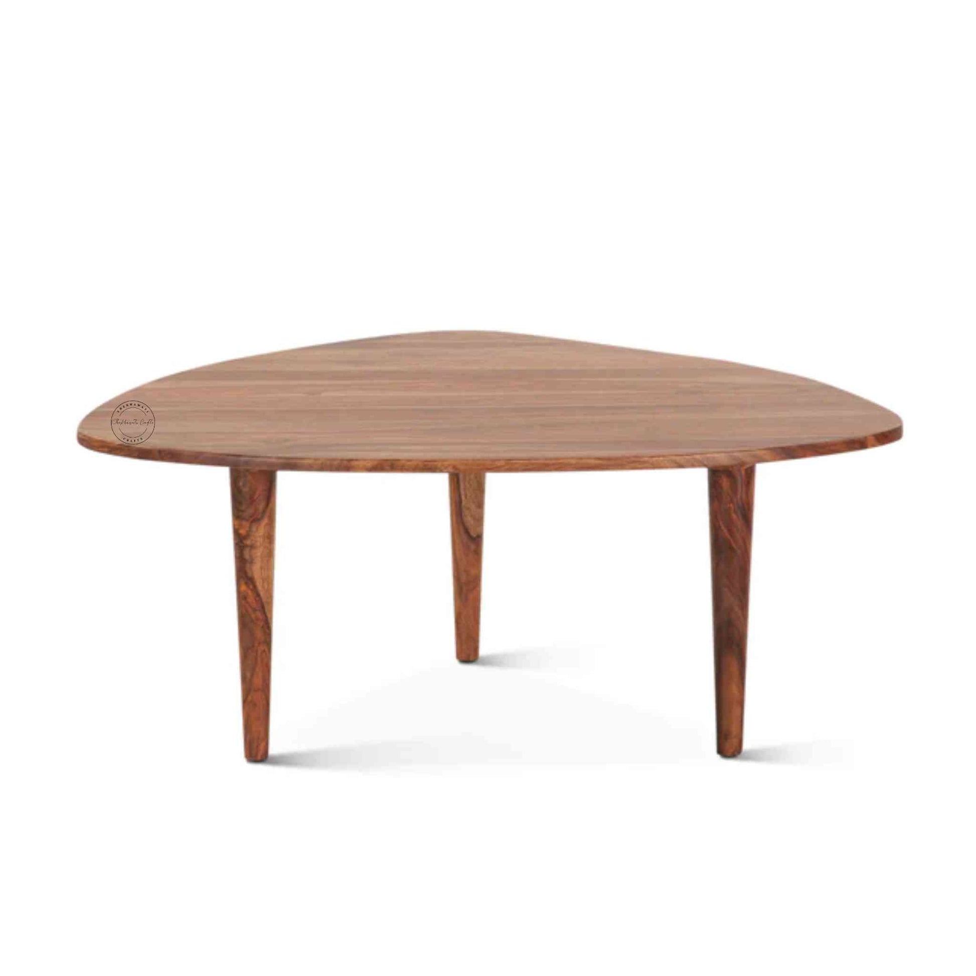 Nitara Coffee Table is crafted from sheesham wood with detachable wood legs and a natural finish.
