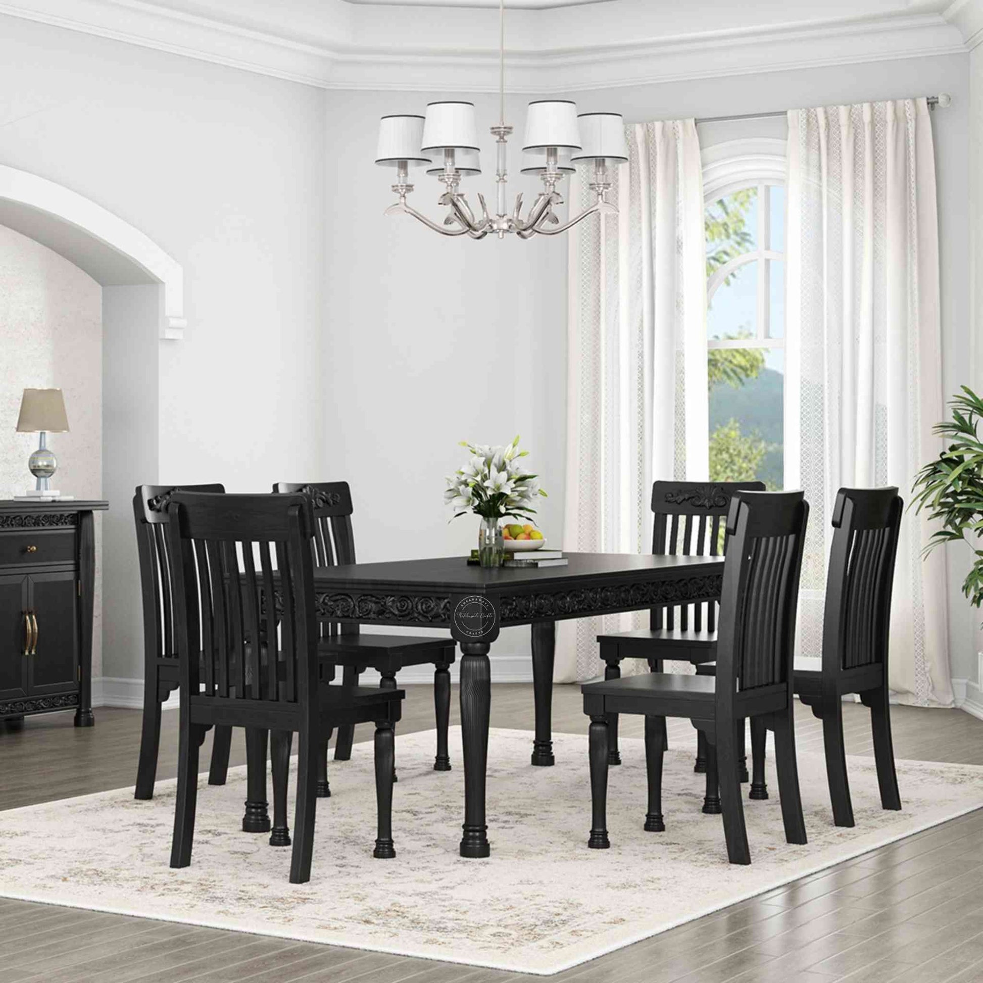 Nobel Dining Table is made from termite-free mango wood with a matte black finish, vintage hand-carved design, and DIY assemble legs.