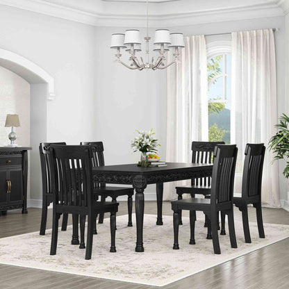 Nobel Dining Table is made from termite-free mango wood with a matte black finish, vintage hand-carved design, and DIY assemble legs.