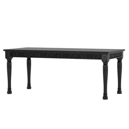 Nobel Dining Table is made from termite-free mango wood with a matte black finish, vintage hand-carved design, and DIY assemble legs.