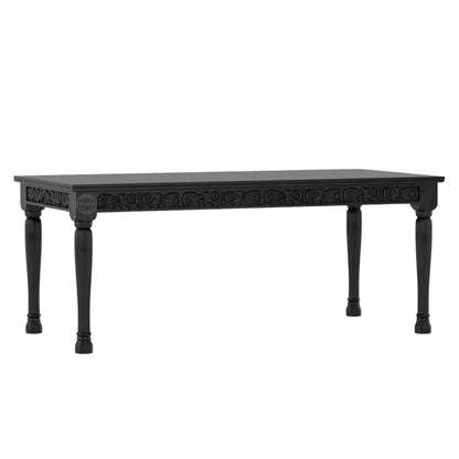 Nobel Dining Table is made from termite-free mango wood with a matte black finish, vintage hand-carved design, and DIY assemble legs.