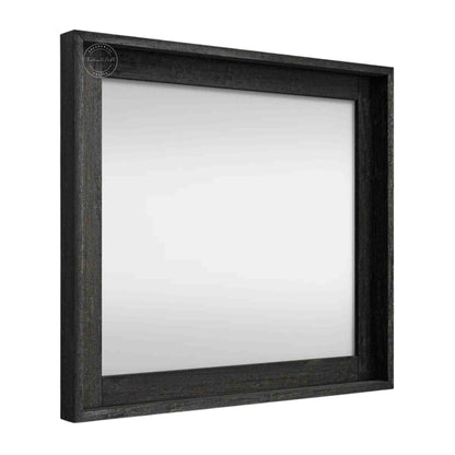 Noir mirror frame is crafted from mango wood with a matte black finish.