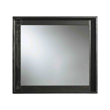 Noir mirror frame is crafted from mango wood with a matte black finish.