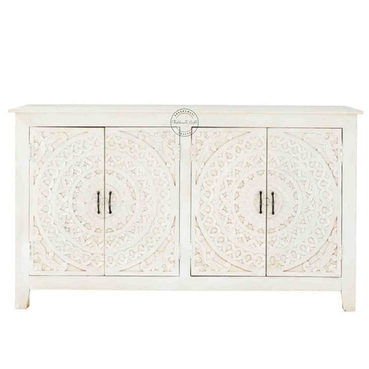 Reyhana handcrafted sideboard made from mango wood features a rustic white finish, with 4 hand-carved doors and foldable shelves.