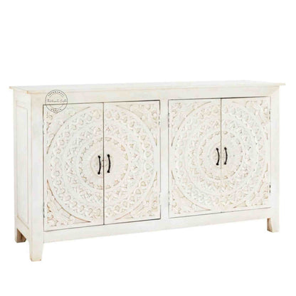 Reyhana handcrafted sideboard made from mango wood features a rustic white finish, with 4 hand-carved doors and foldable shelves.