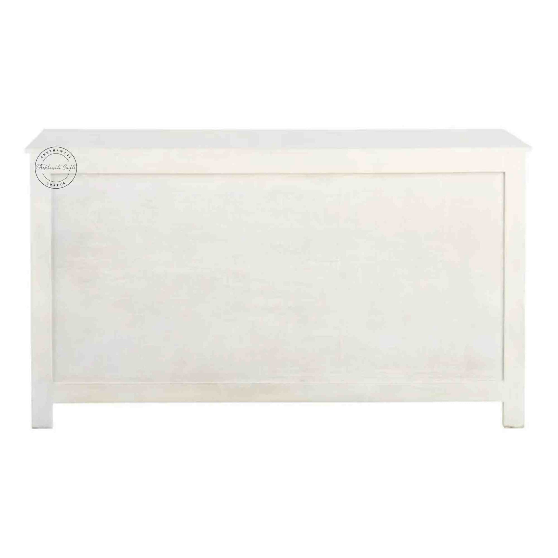 Reyhana handcrafted sideboard made from mango wood features a rustic white finish, with 4 hand-carved doors and foldable shelves.