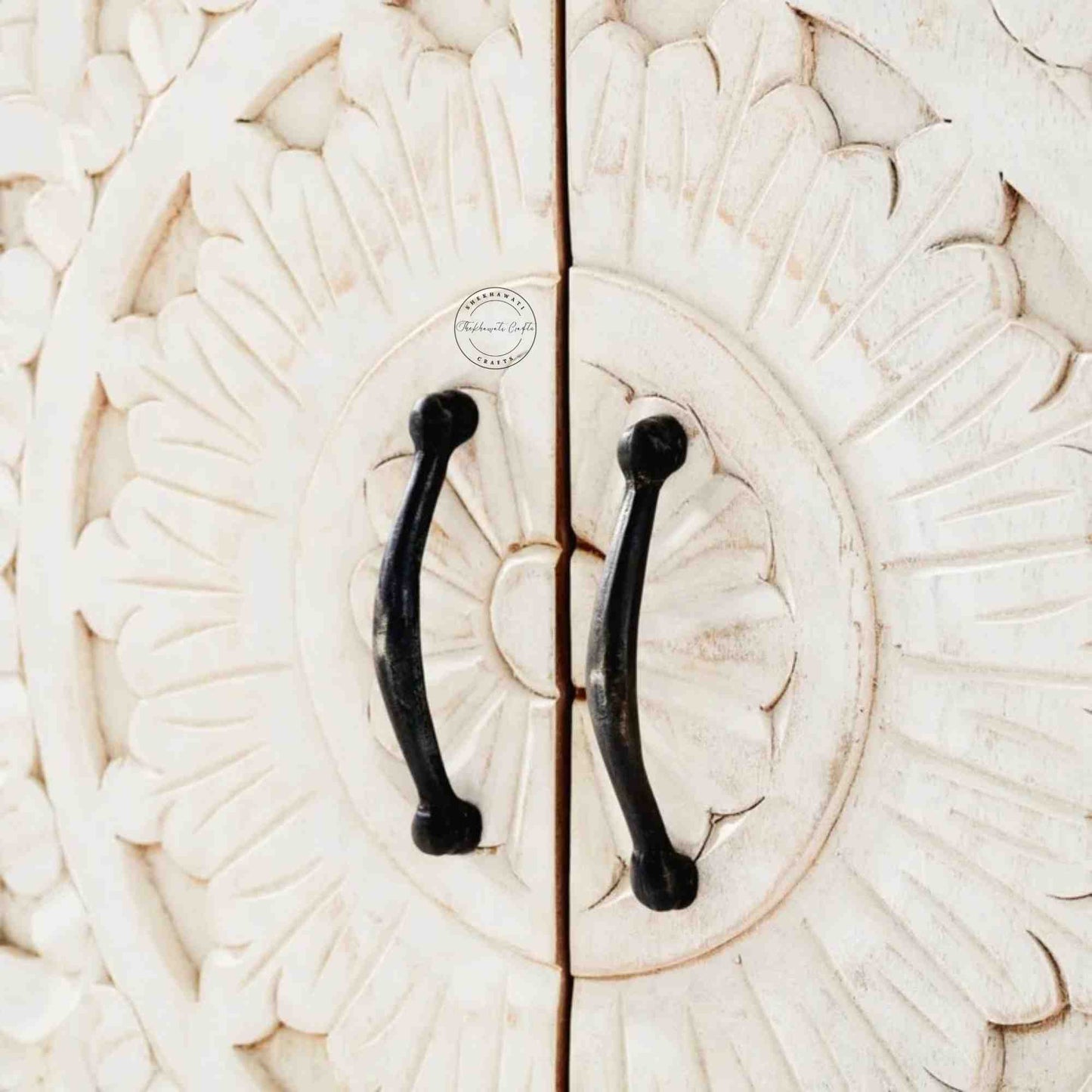 Reyhana handcrafted sideboard made from mango wood features a rustic white finish, with 4 hand-carved doors and foldable shelves.