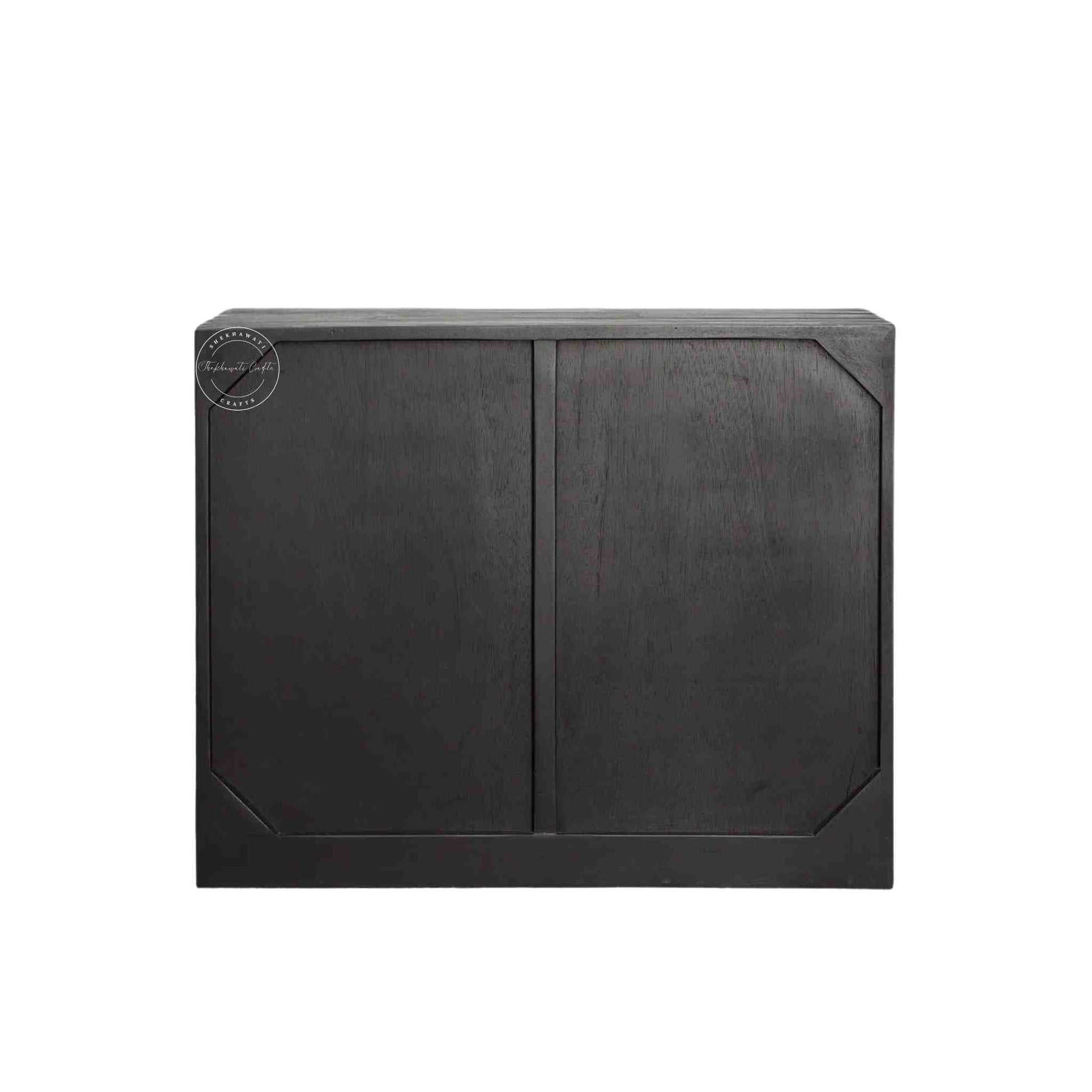 Royal Aravalli Sideboard is handmade from solid mango wood and a matte black finish.