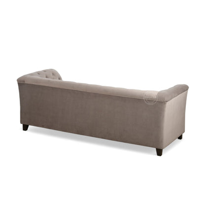 backside view of classic tufted loveseat sofa upholstered in a textured taupe fabric, featuring dark wooden legs, shown against a plain white background