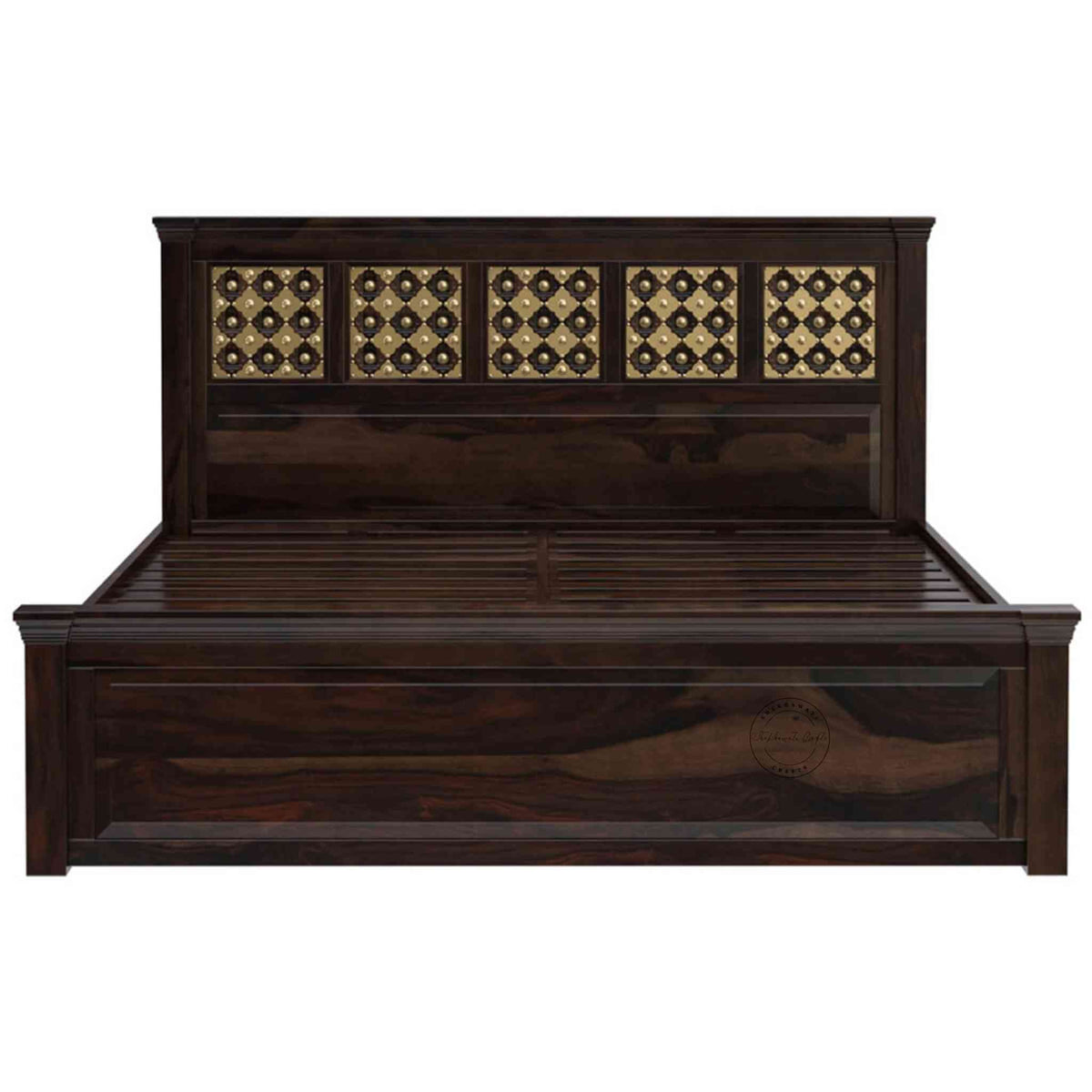 A king size wooden bed with brass inlays and storage drawers, in a room with light walls.