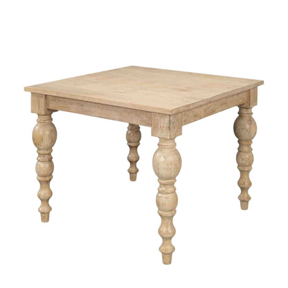 handmade spindle mango wood dining table in natural mango wood finish and vintage design legs.