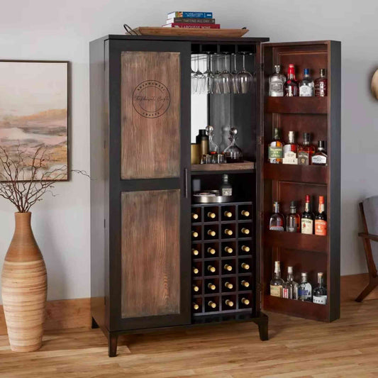 The Pint Bar Cabinet is handcrafted with mango wood and a dual tone finish, 2 doors, bottles and glass sections.