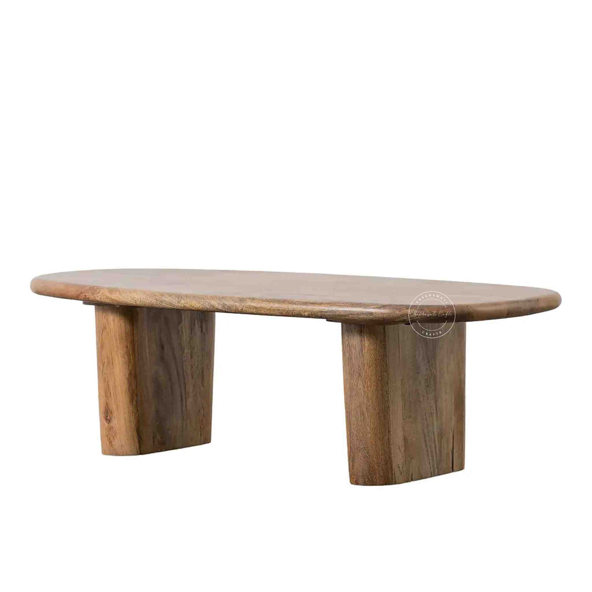 Handcrafted Tiara Mango Wood Coffee Table featuring an oval design and foldable legs.