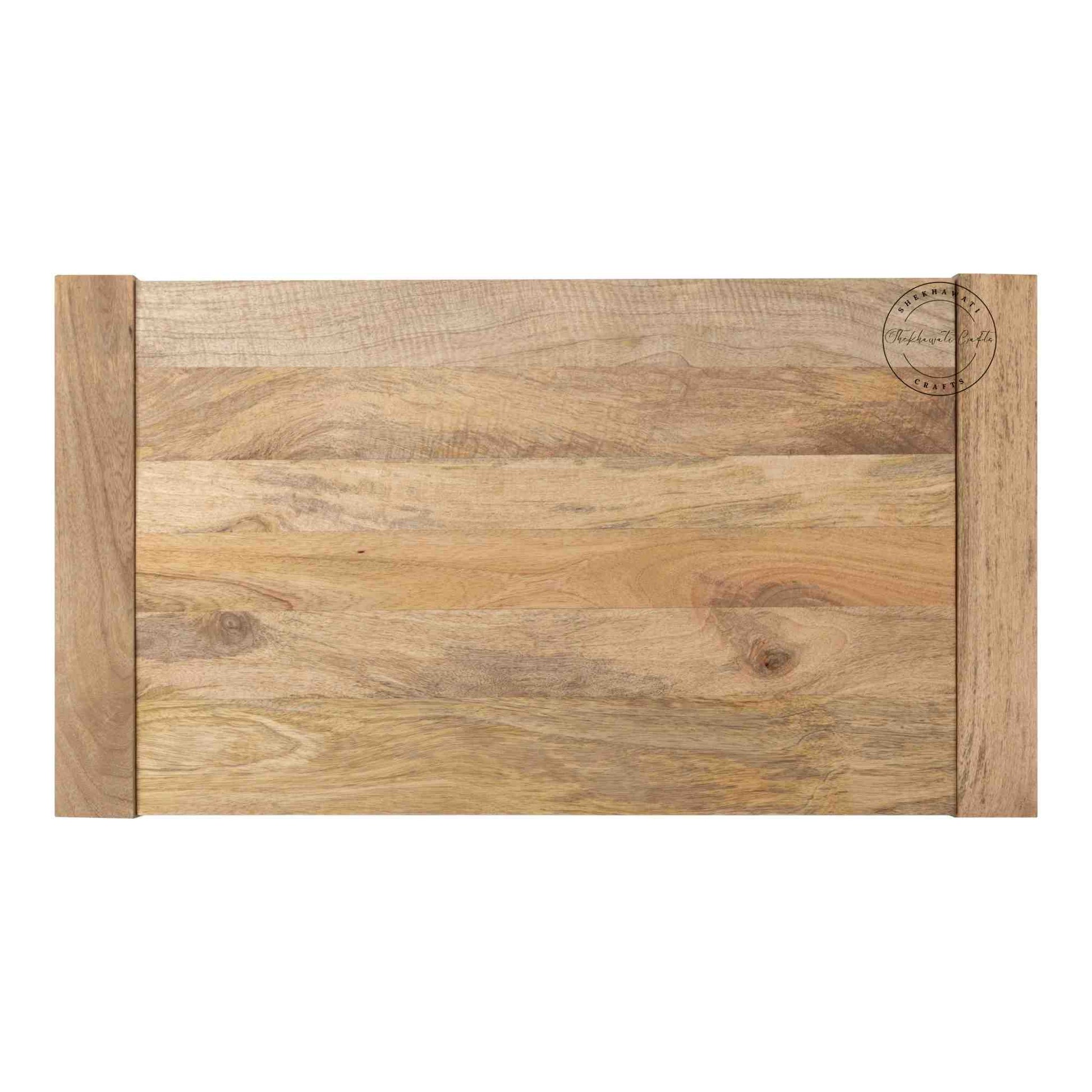 Travis Center Table is handcrafted from mango wood and features a natural finish with foldable legs.