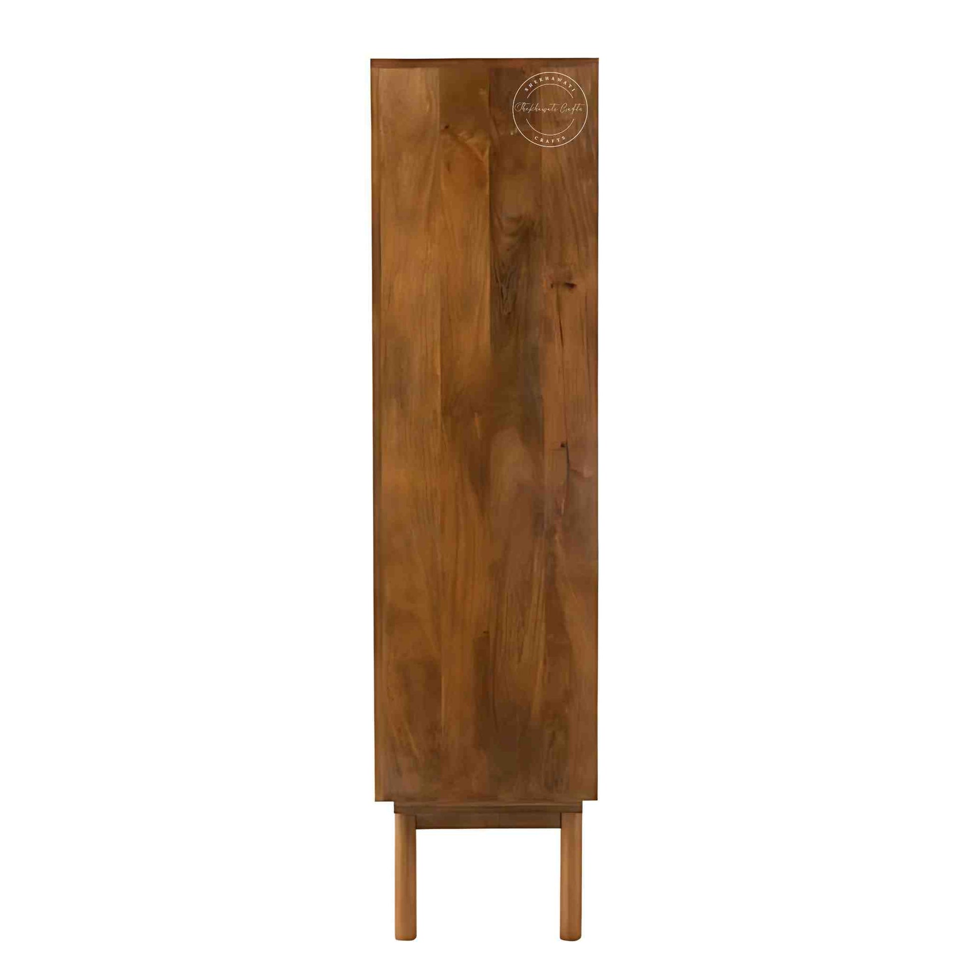 Handcrafted Umber Cabinet made from mango wood with a natural wood finish. It features four doors and detachable shelves.