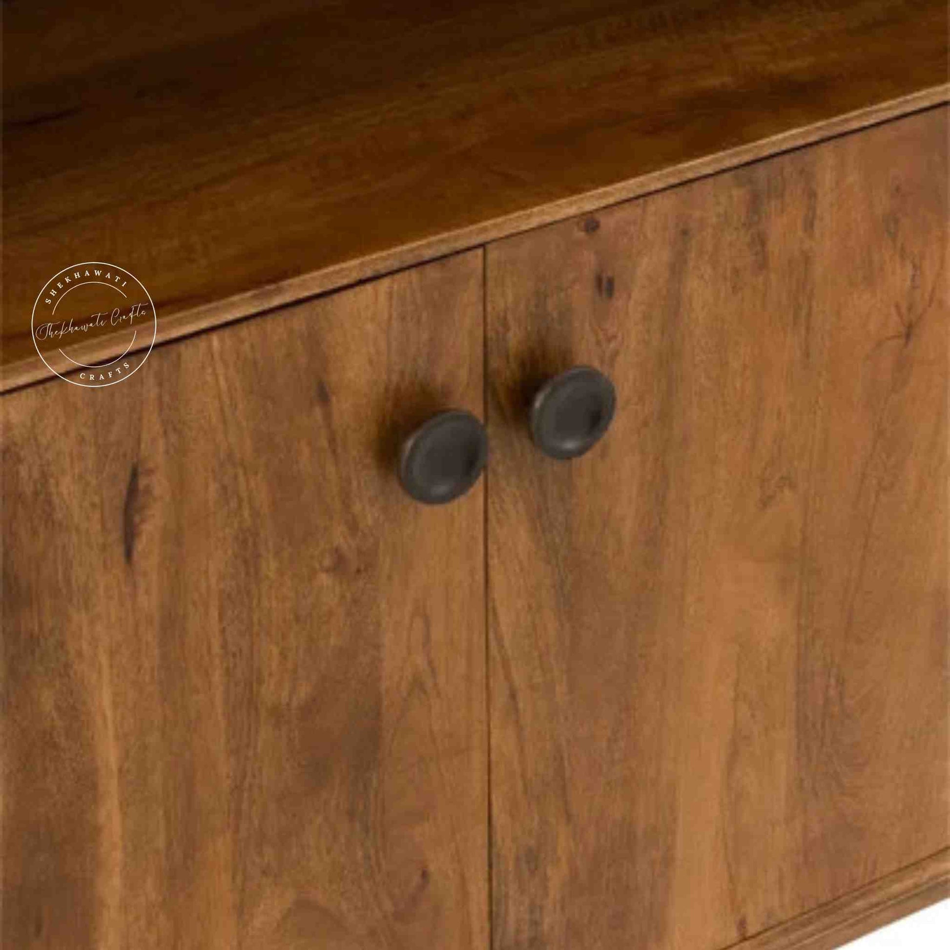 Handcrafted Umber Cabinet made from mango wood with a natural wood finish. It features four doors and detachable shelves.