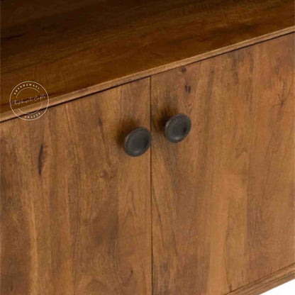 Handcrafted Umber Cabinet made from mango wood with a natural wood finish. It features four doors and detachable shelves.