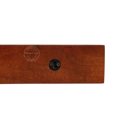 handcrafted Veda mango wood hanging wall shelf in honey finish.