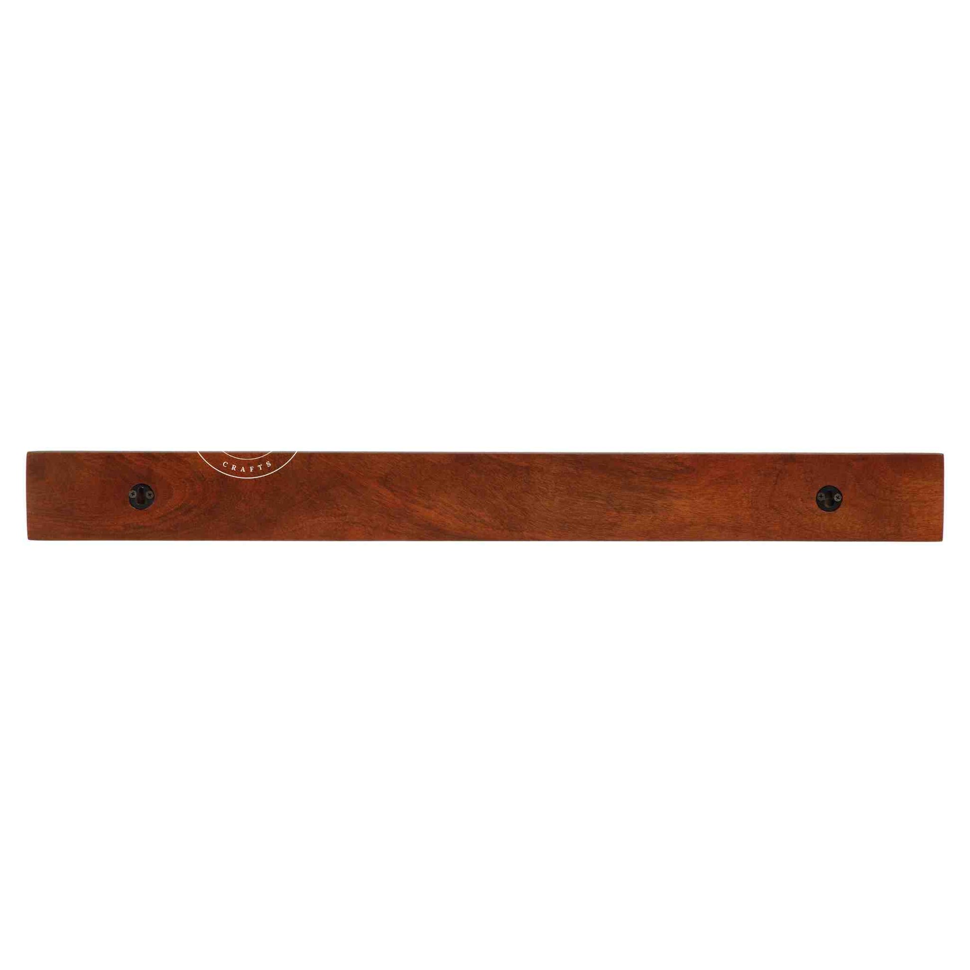 handcrafted Veda mango wood hanging wall shelf in honey finish.