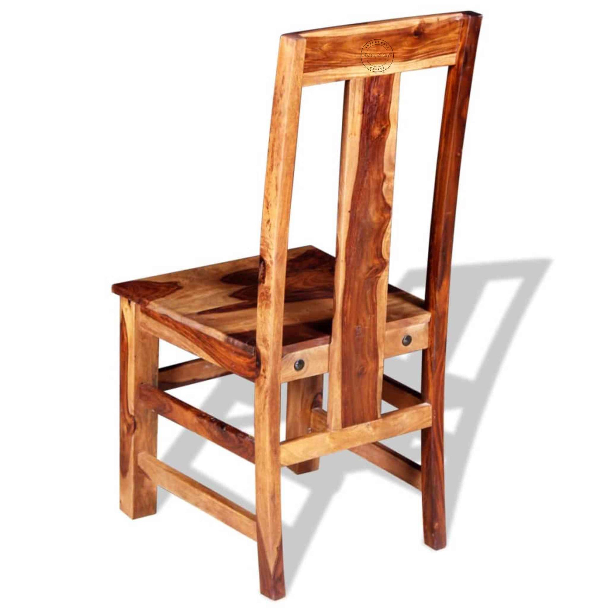 Vira Chair is handcrafted with sheesham wood and natural finish.